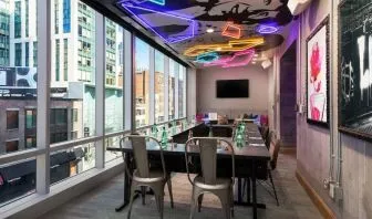 Meeting room with natural light at Moxy Boston Downtown.