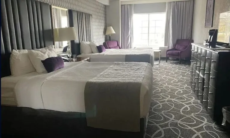 Day use twin room with lounge seating at Park Manor Hotel. 