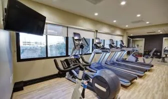 Well equipped fitness center at Embassy Suites By Hilton Santa Clara Silicon Valley.