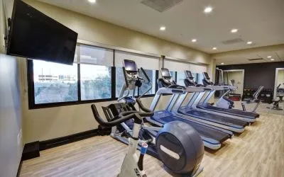 Well equipped fitness center at Embassy Suites By Hilton Santa Clara Silicon Valley.
