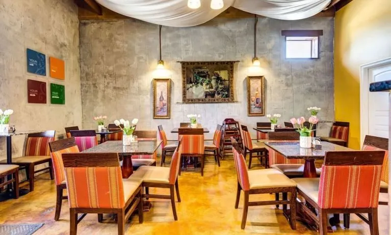 Dining area perfect for coworking at Comfort Inn Pomona Near Fairplex.