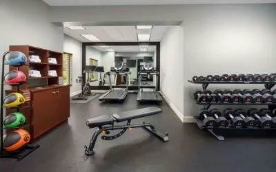 Fitness center at Homewood Suites By Hilton Miami Airport-Blue Lagoon.