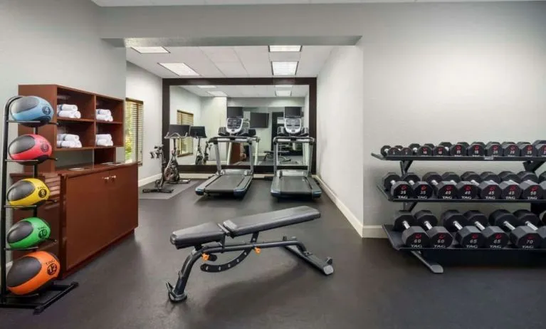 Fitness center at Homewood Suites By Hilton Miami Airport-Blue Lagoon.