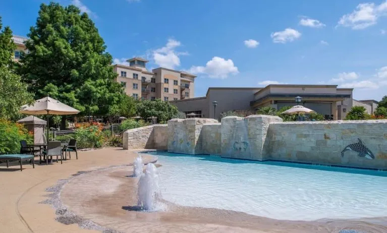 One of the 3 outdoor pools at Hilton San Antonio Hill Country.