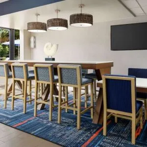 Lobby and coworking lounge at Hampton Inn Ft. Lauderdale-Cypress Creek.