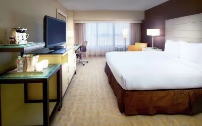 Day use room with work desk and natural light at Hilton Los Angeles Airport.