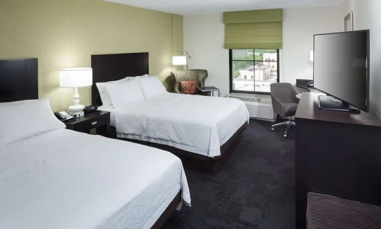 Day use twin room with work desk at Hampton Inn & Suites Gainesville-Downtown.