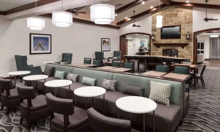 Dining area at Homewood Suites By Hilton Denton.