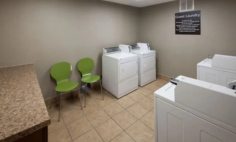 Launry room at Homewood Suites By Hilton Denton.