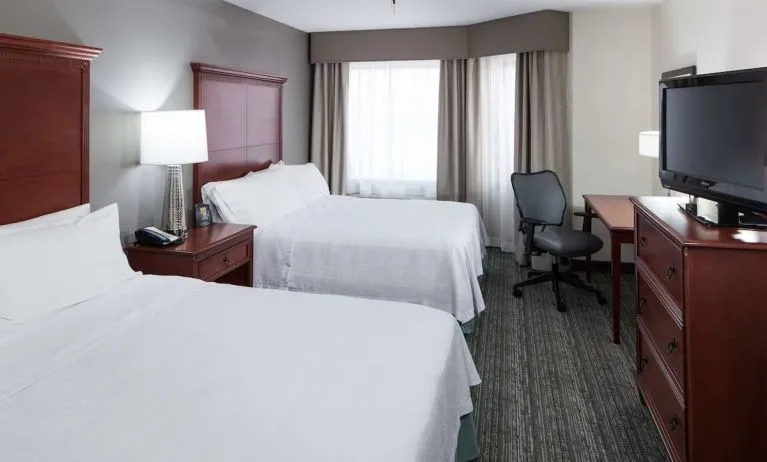 Day use twin room with work desk at Homewood Suites By Hilton Denton. 