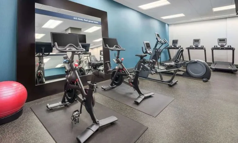 Fully equipped fitness center at Hampton Inn Manhattan/Times Square Central.