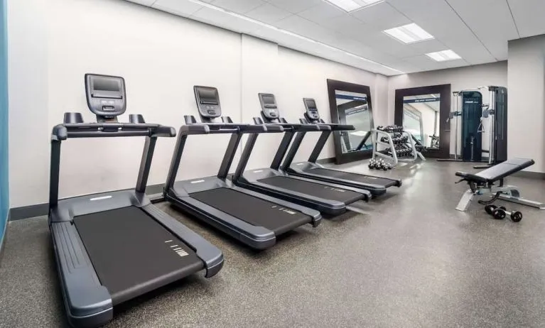 Fully equipped fitness center at Hampton Inn Manhattan/Times Square Central.