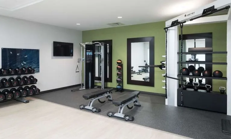 Fully equipped fitness center at Home2 Suites By Hilton Cape Canaveral Cruise Port.