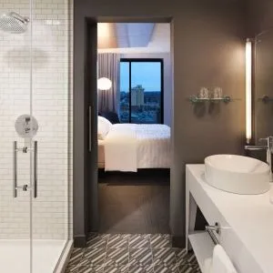 Private guest bathroom with shower at Le Méridien Columbus, The Joseph.