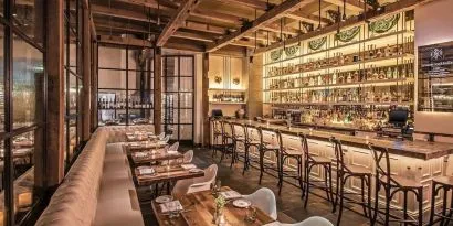 On-site bar and dining area at Le Méridien Columbus, The Joseph.