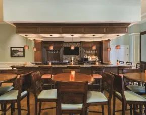 On-site bar and restaurant at Embassy Suites By Hilton Savannah.