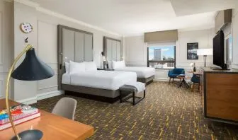 Bright and spacious day use twin room with work desk at Stanford Court San Francisco.
