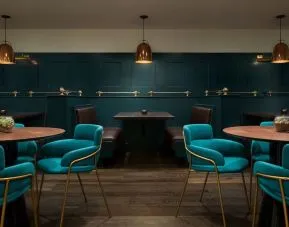 Dining area with comfortable seating, perfect for co-working at Stanford Court San Francisco.