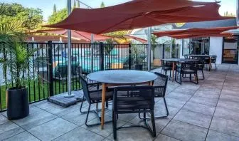 Hotel terrace with lounge seating at Hampton Inn Vallejo.