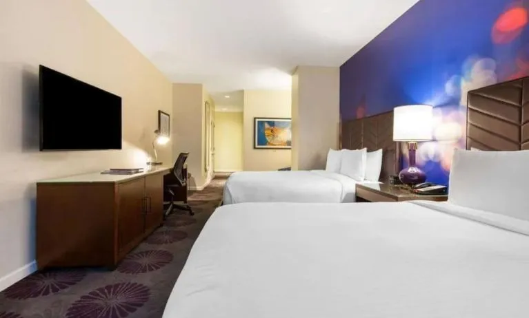 Day use twin room with work desk and private guest bathroom at The Chicago Hotel Collection - Magnificent Mile.