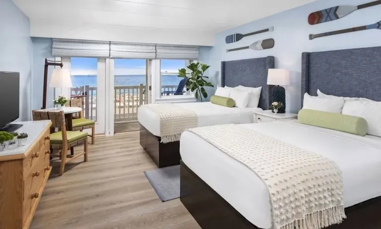 Day use twin room with workspace and balcony at Sea Crest Beach Hotel.