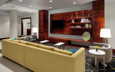 Lobby lounge with comfortable seating, perfect for coworking at Courtyard Boston Cambridge.