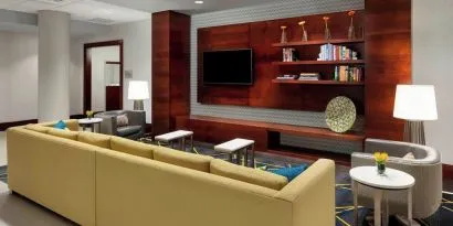 Lobby lounge with comfortable seating, perfect for coworking at Courtyard Boston Cambridge.