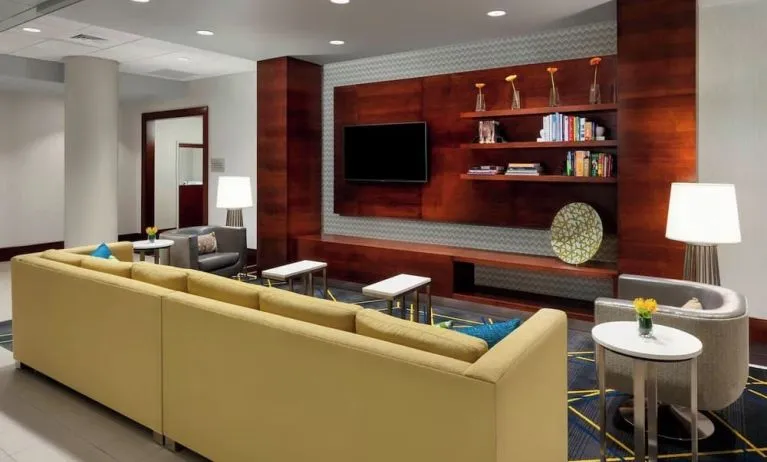 Lobby lounge with comfortable seating, perfect for coworking at Courtyard Boston Cambridge.