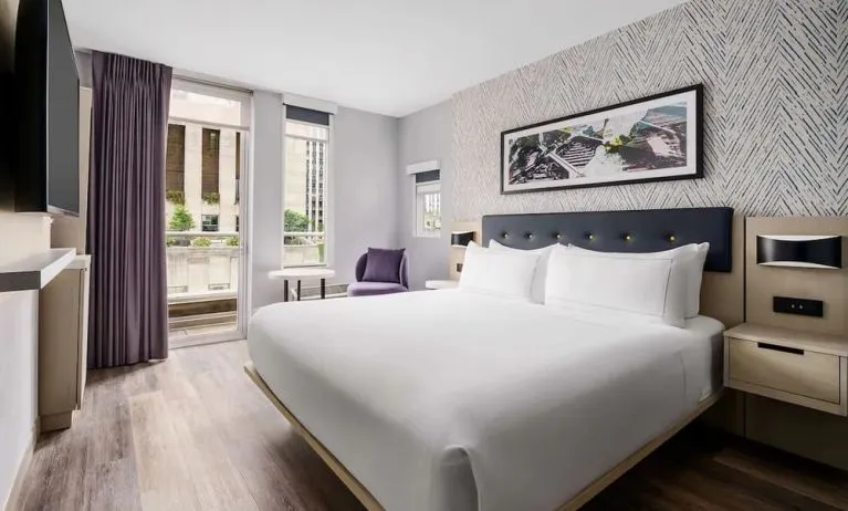 Day use room with workspace, floor to ceiling windows and private bathrooma at DoubleTree By Hilton New York Midtown Fifth Ave.
