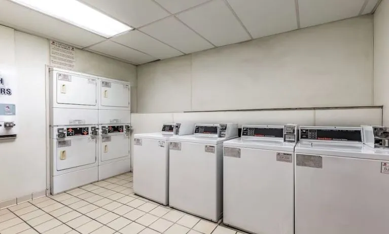 Laundry room is available for guests at Red Roof PLUS+ & Suites Houston - IAH Airport SW.