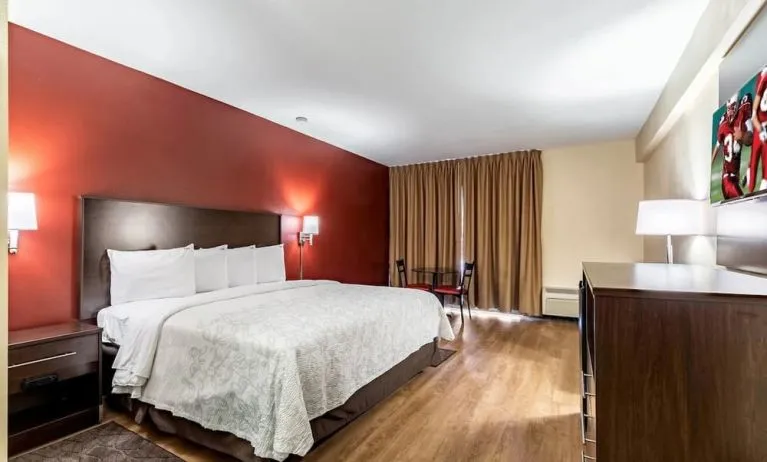 King room with workspace at Red Roof PLUS+ & Suites Houston - IAH Airport SW.
