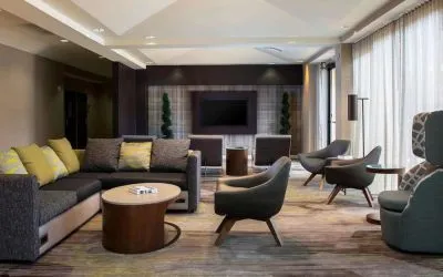 Lobby lounge area with comfortable seating at Sonesta Select Atlanta Norcross I-85.