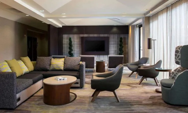 Lobby lounge area with comfortable seating at Sonesta Select Atlanta Norcross I-85.