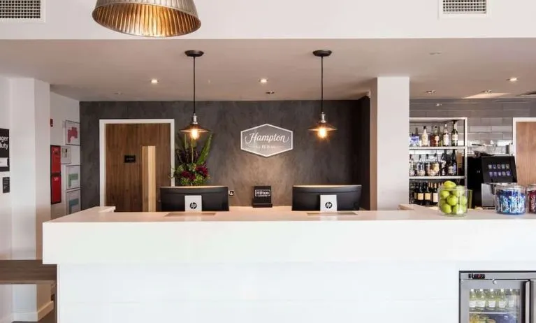 Reception desk at Hampton By Hilton Humberside Airport.