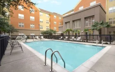 Outdoor pool at Homewood Suites By Hilton Shreveport.