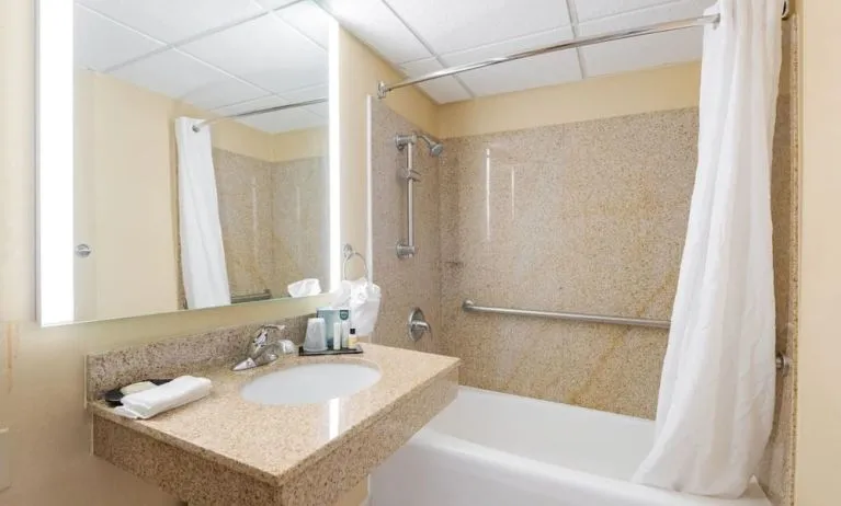 Private guest bathroom with free toiletries at Wyndham Omaha.
