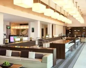 Lounge area and workspace at Element Miami International Airport.