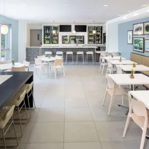 Dining area an on-site bar at Element Miami International Airport.