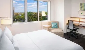 Day use room with work desk at Element Miami International Airport.