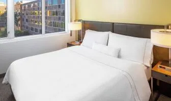 King bed at Element Miami International Airport.