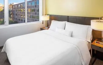 King bed at Element Miami International Airport.