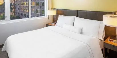 King bed at Element Miami International Airport.