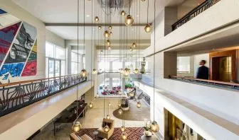 Lobby and coworking lounge at Pullman Miami Airport.