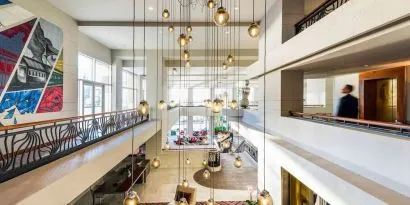 Lobby and coworking lounge at Pullman Miami Airport.