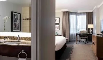 Day use room with work desk and private bathroom at Pullman Miami Airport.