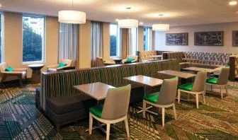 Dining area perfect for coworking at Homewood Suites By Hilton LAX Airport.