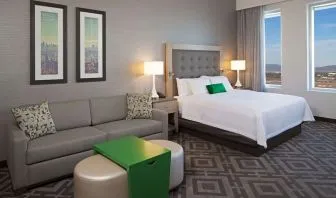 Day use room with sofa at Homewood Suites By Hilton LAX Airport.
