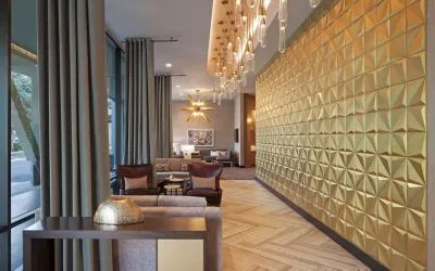 Lobby and coworking lounge at Homewood Suites By Hilton LAX Airport.