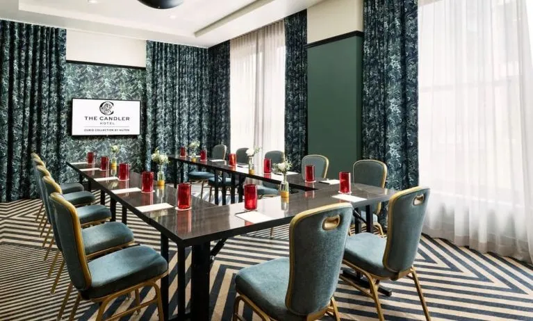 Professional meeting room at The Candler Hotel Atlanta, Curio Collection By Hilton.