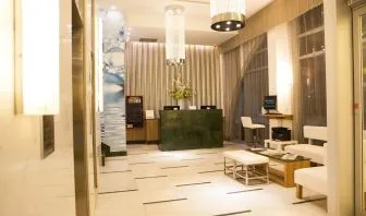 Hotel lobby and workspace at Wyndham Garden Brooklyn Sunset Park.